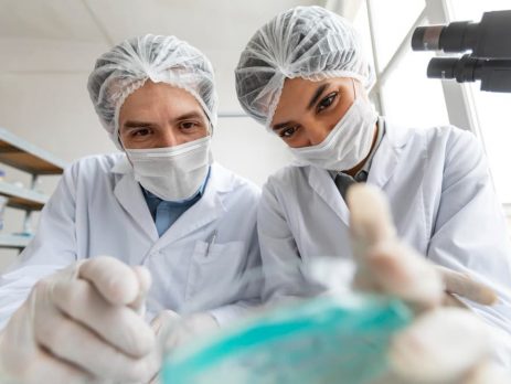 close-up-scientists-with-petri-dishes (1) (1)